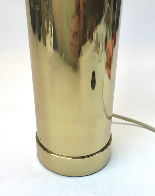 Gold-colored electric kettle on a white background