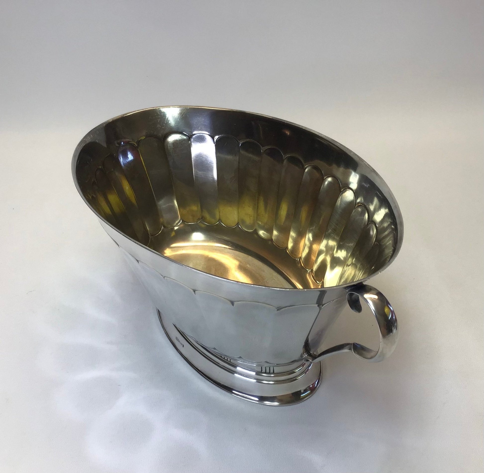 Silver trophy cup on a white background