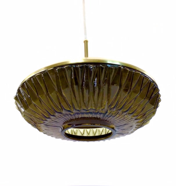 Decorative ceiling light fixture with ribbed design on a white background