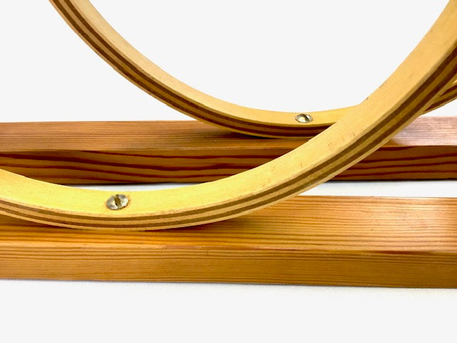 Wooden circular frames on a white background