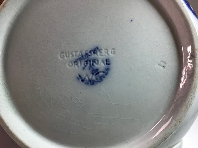 Ceramic dish with 'Gustavsberg Original' branding on a white background