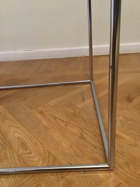 Metal frame on a wooden floor