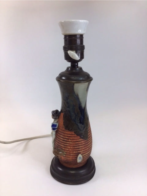 Decorative lamp with a unique design on a white background