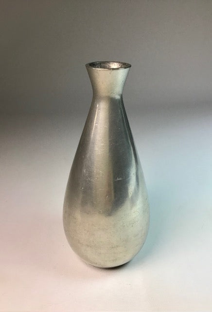 Silver vase on a gradient gray background