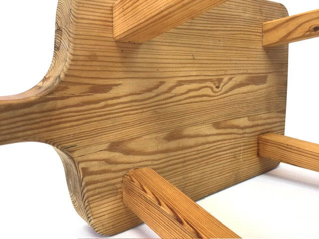 Wooden spoon rest on a white background