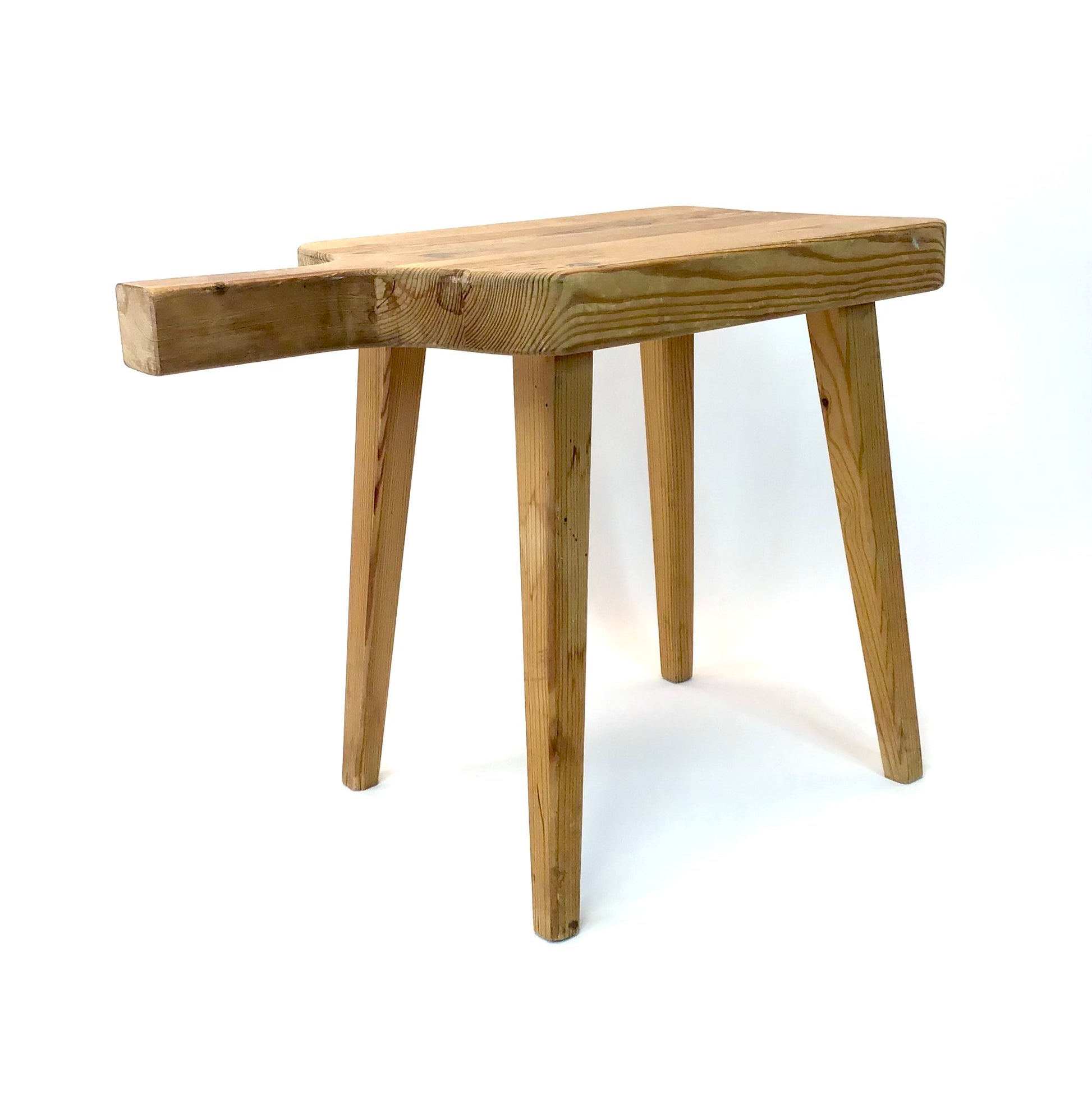 Wooden bench with a minimalist design on a white background